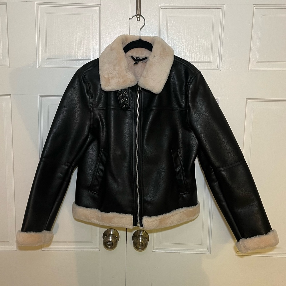 Leather jacket with cream fur